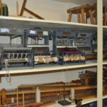 Looms and other weaving equipment at Thousand Islands Museum Looms and other weaving equipment