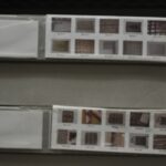 Archival boxes of samples at Thousand Islands weaving museum Archival boxes of weaving samples